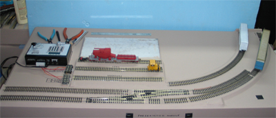 The Presentation module, as seen from the "public" side of the module. The tracks allow model railroad cars and locomotives to be tested. The flat areas provide space for working on models.