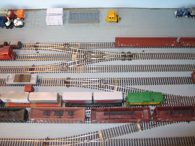 An overhead view of the roughing mill module, with track complete, but very little scenery in place.
