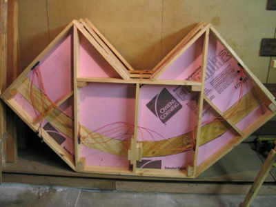 Wood framing supports the track and the light foam scenery.  Some of the early modules had more bracing than was necessary, making them heavier than the newer modules.