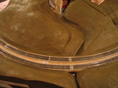 Carved foam scenery with a coat of paint.